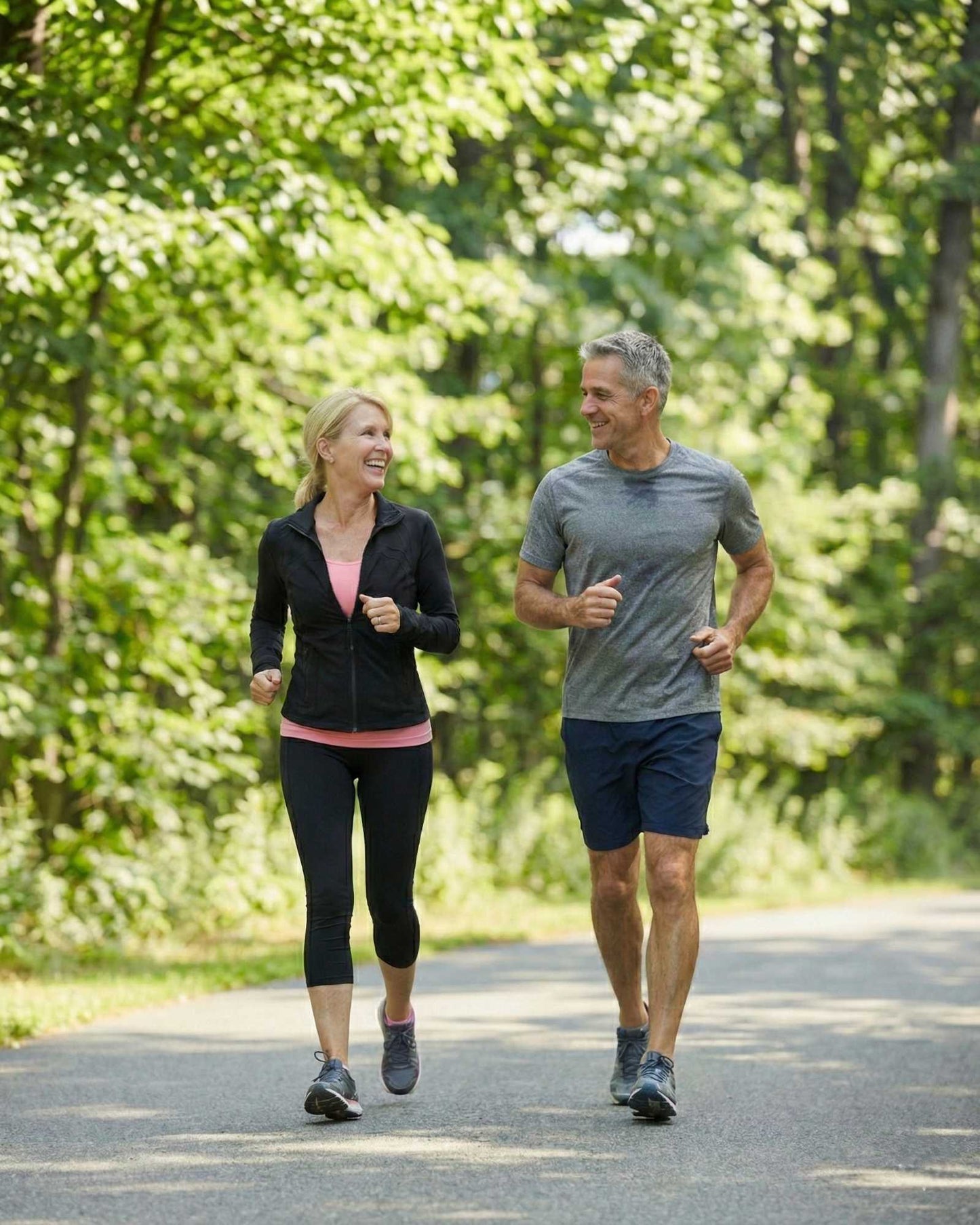 Senior couple jogging in a park
